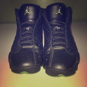 All black Jordan 13’s
